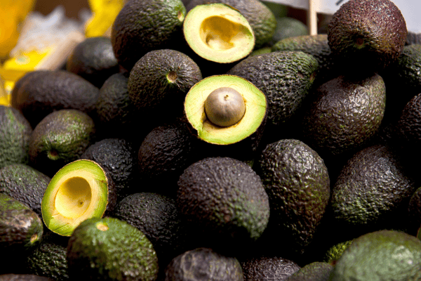 A perfectly ripe avocado with its smooth, creamy texture, ready to be enjoyed in various dishes.
